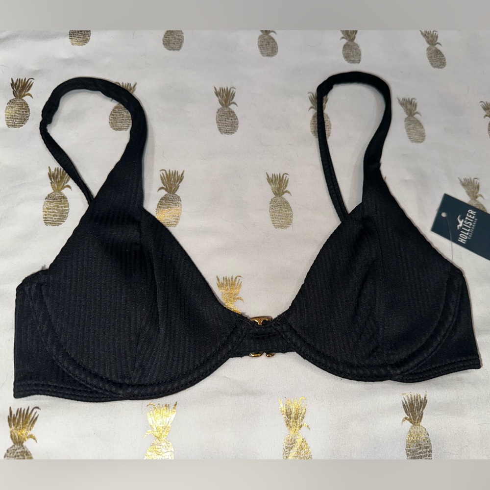 NWT Hollister Black Swim Top XXS, Gold hook back, Ribbed texture.